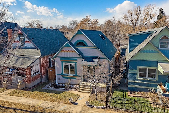 view of front of home with fence