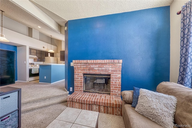 4760 S Wadsworth Blvd Unit 302, Littleton, CO 80123 - carpeted living room with a textured ceiling, a brick fireplace, and baseboards
