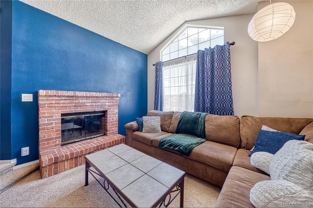 4760 S Wadsworth Blvd Unit 302, Littleton, CO 80123 - living room featuring a textured ceiling, a textured wall, vaulted ceiling, carpet flooring, and a fireplace