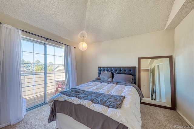 4760 S Wadsworth Blvd Unit 302, Littleton, CO 80123 - bedroom featuring carpet flooring, access to exterior, a textured ceiling, and baseboards