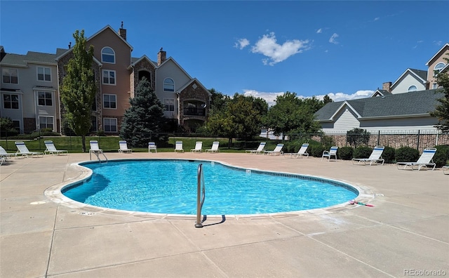 view of pool featuring a patio area