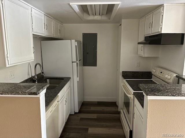 kitchen with electric panel, white cabinets, sink, dark hardwood / wood-style floors, and white appliances