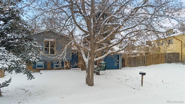 view of yard layered in snow