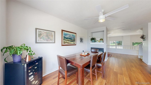 2560 Concord Cir, Lafayette, CO 80026 - dining space with light wood finished floors and ceiling fan