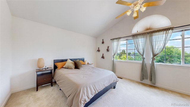 2560 Concord Cir, Lafayette, CO 80026 - bedroom with multiple windows, light carpet, vaulted ceiling, and ceiling fan