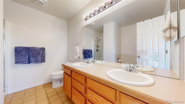 2560 Concord Cir, Lafayette, CO 80026 - bathroom featuring an enclosed shower, double vanity, and tile patterned floors