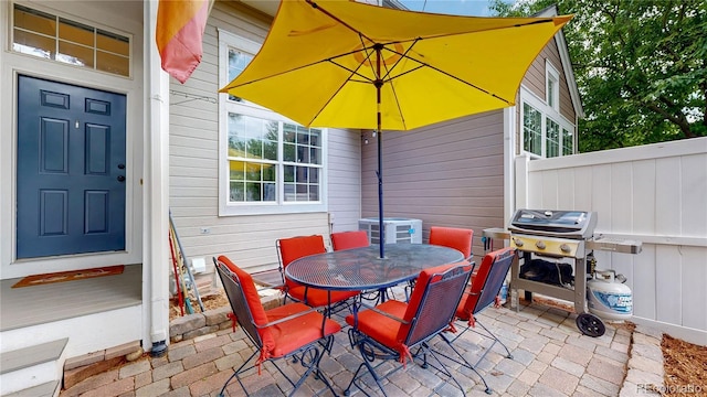 2560 Concord Cir, Lafayette, CO 80026 - view of patio / terrace featuring outdoor dining space and area for grilling