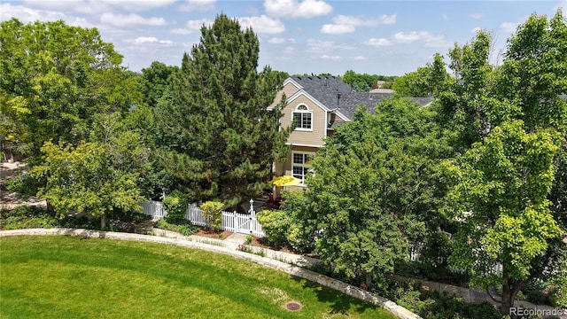 2560 Concord Cir, Lafayette, CO 80026 - view of front facade with a chimney