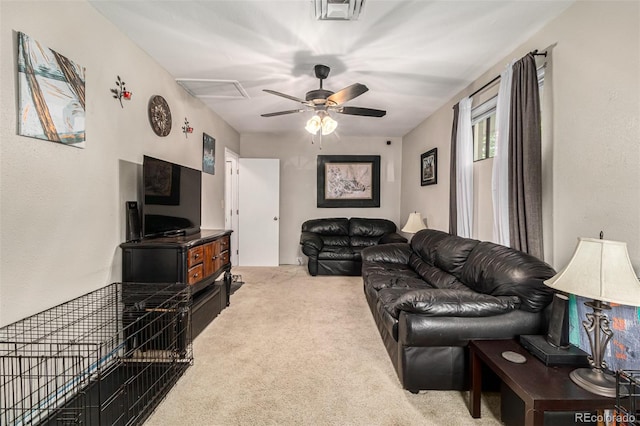 living room featuring ceiling fan and light colored carpet