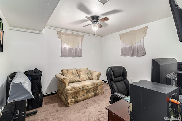 office space with carpet and ceiling fan