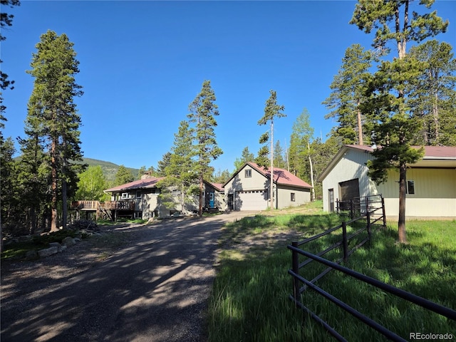 1194 Camp Eden Rd, Golden, CO 80403 - view of road featuring a gated entry and a mountain view
