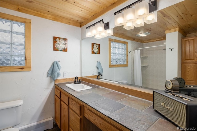 1194 Camp Eden Rd, Golden, CO 80403 - bathroom featuring wooden ceiling, toilet, a baseboard radiator, vanity, and a shower with shower curtain