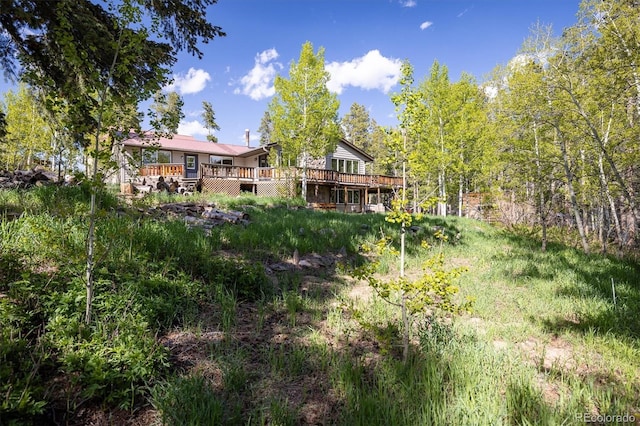 1194 Camp Eden Rd, Golden, CO 80403 - view of yard with a deck
