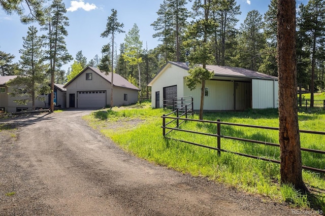 1194 Camp Eden Rd, Golden, CO 80403 - view of front of property featuring a detached garage and an outdoor structure