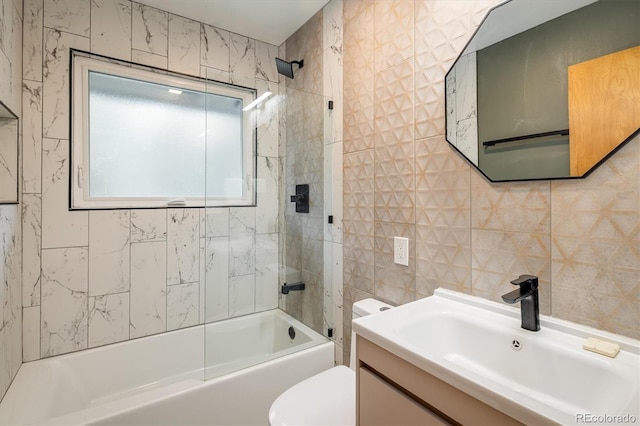 1194 Camp Eden Rd, Golden, CO 80403 - full bath with tile walls, vanity, toilet, and washtub / shower combination