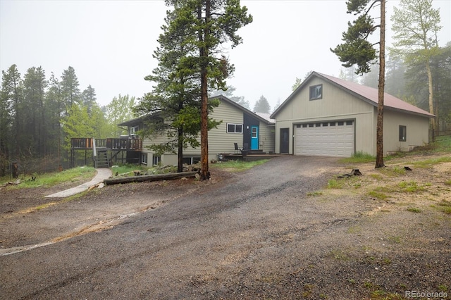 1194 Camp Eden Rd, Golden, CO 80403 - single story home with a deck and dirt driveway