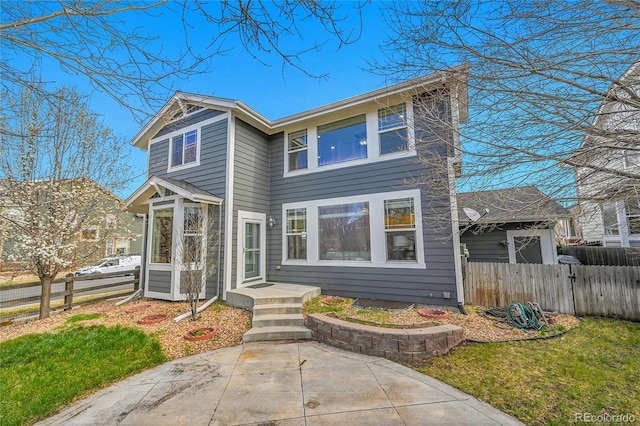 view of front of property with fence
