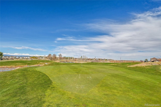 surrounding community featuring a yard