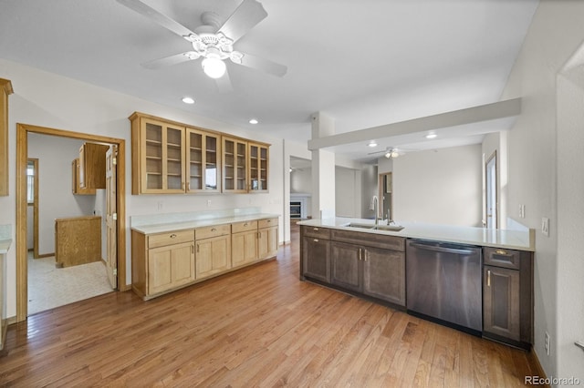 32501 E 137th Way, Brighton, CO 80603 - kitchen featuring dishwasher, a sink, ceiling fan, light wood-type flooring, and light countertops