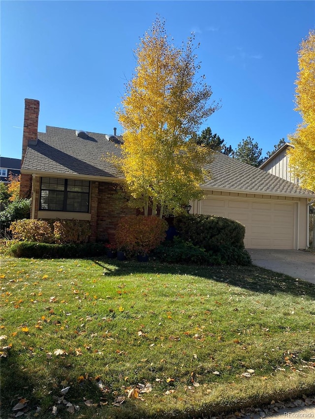 view of property exterior featuring a garage and a lawn