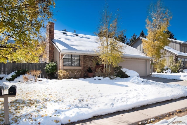 view of front of home with a garage