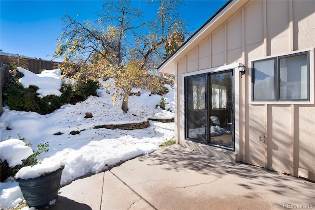 view of snow covered patio