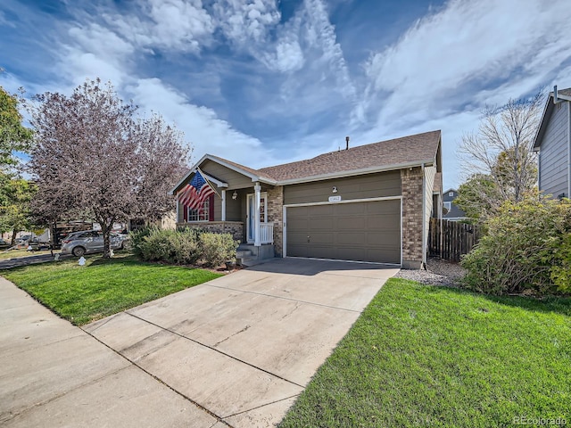 ranch-style home with a front lawn and a garage