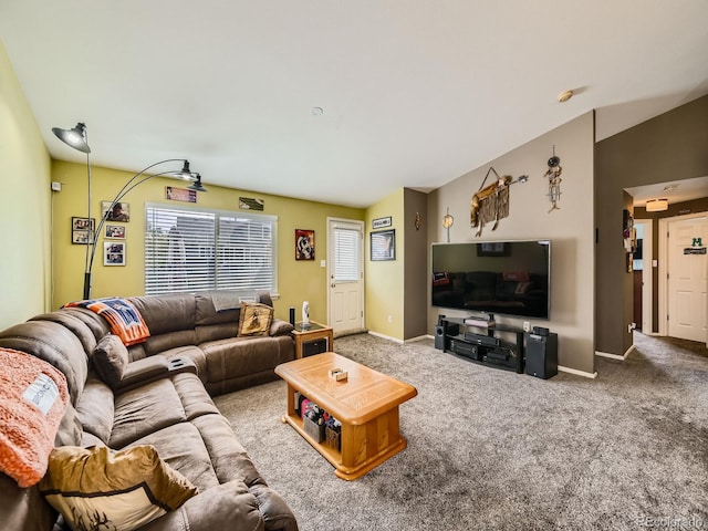 living room featuring carpet flooring and vaulted ceiling