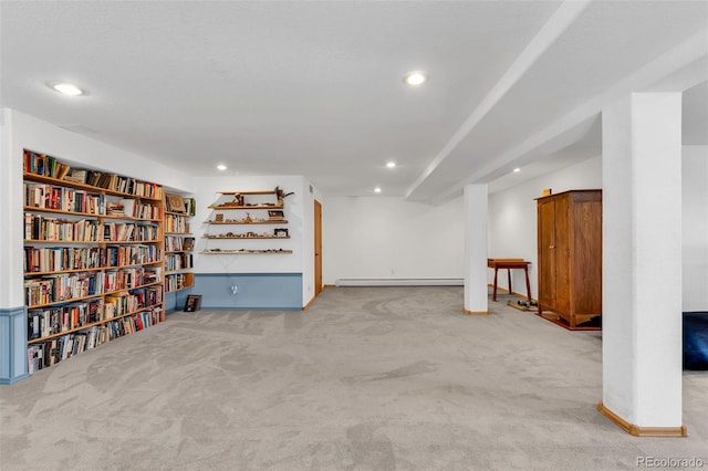 interior space with carpet flooring and a baseboard radiator