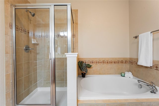 full bath with a shower stall and a bath
