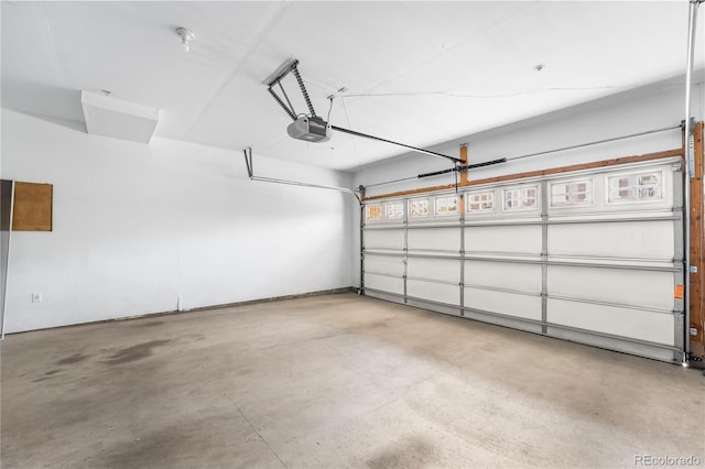 garage featuring a garage door opener