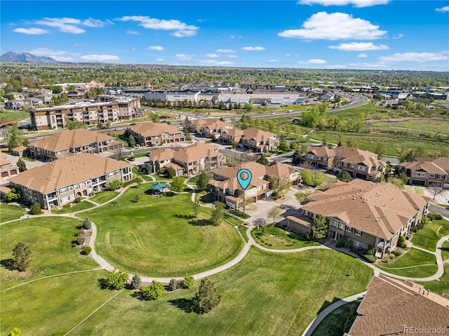 aerial overview of property's location with nearby suburban area