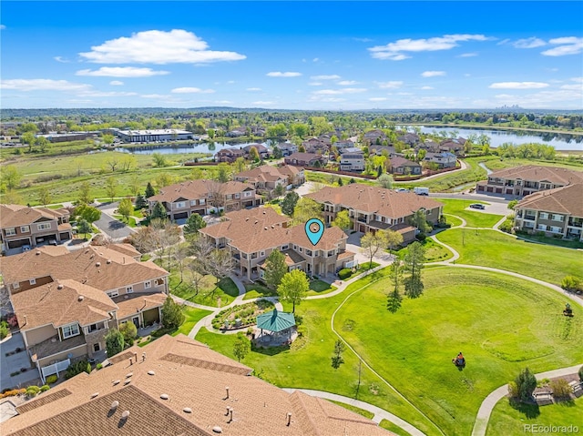 aerial view of residential area with a nearby body of water