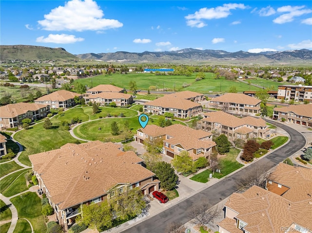 aerial perspective of suburban area featuring a mountainous background