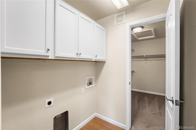 6202 Kilmer Loop Unit 202, Golden, CO 80403 - clothes washing area featuring cabinet space, washer hookup, electric dryer hookup, and baseboards