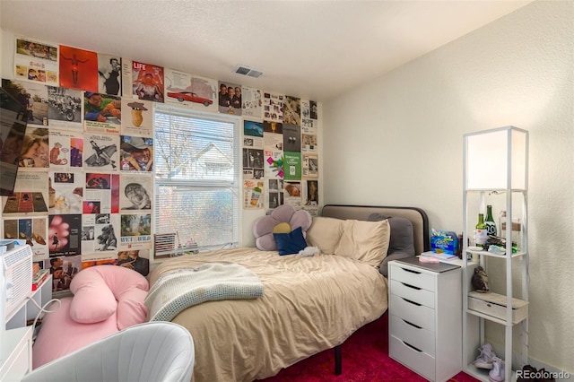 bedroom featuring carpet