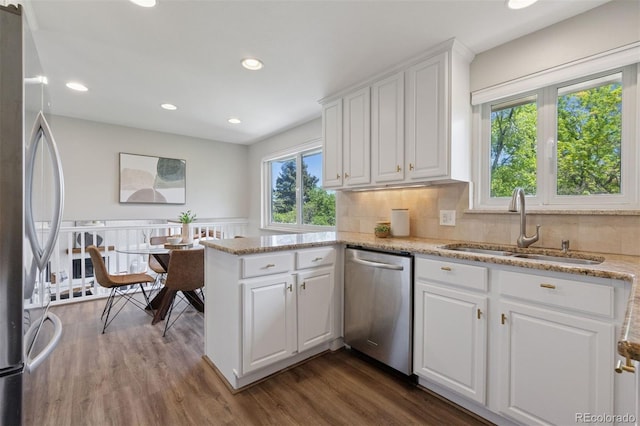1931 Foothills Rd, Golden, CO 80401 - kitchen featuring stainless steel appliances, a sink, recessed lighting, dark wood-style flooring, and white cabinets