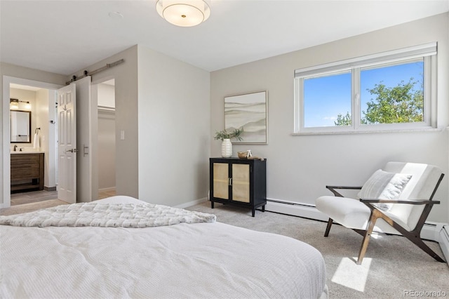 1931 Foothills Rd, Golden, CO 80401 - bedroom featuring light carpet, baseboards, a barn door, a baseboard heating unit, and connected bathroom