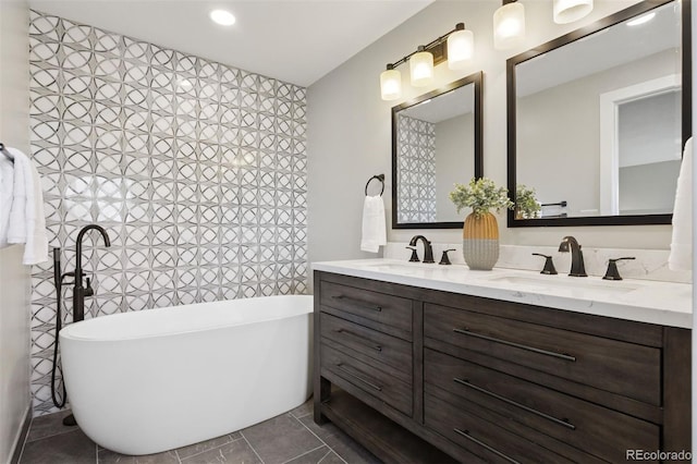 1931 Foothills Rd, Golden, CO 80401 - bathroom with double vanity, a freestanding tub, and tile patterned flooring