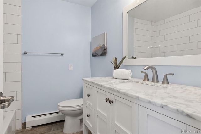 1931 Foothills Rd, Golden, CO 80401 - bathroom with baseboard heating, vanity, wood finished floors, toilet, and shower / bathtub combination
