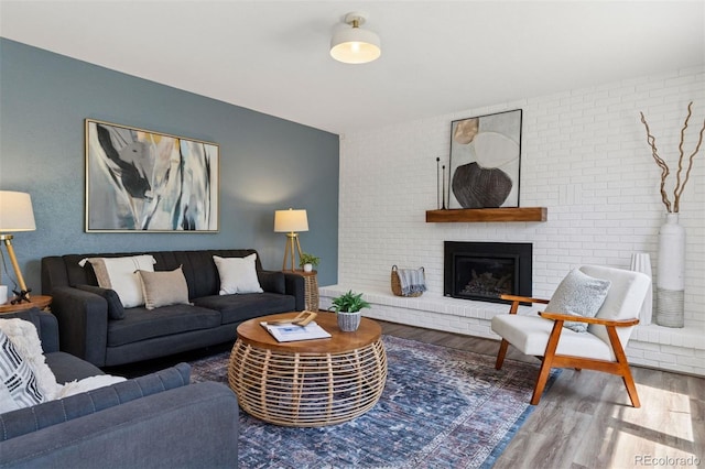 1931 Foothills Rd, Golden, CO 80401 - living area featuring wood finished floors and a fireplace