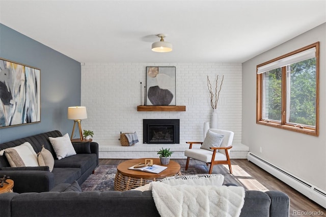 1931 Foothills Rd, Golden, CO 80401 - living room featuring a baseboard radiator, wood finished floors, and a fireplace