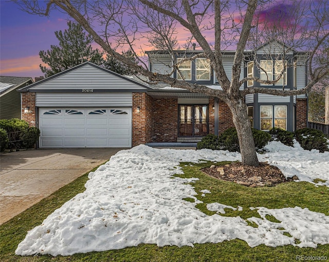 view of front of property with a garage