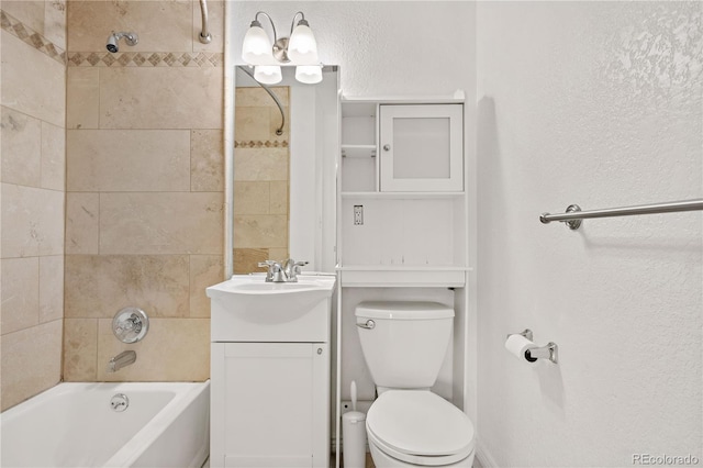 bathroom featuring shower / tub combination, toilet, vanity, and a textured wall