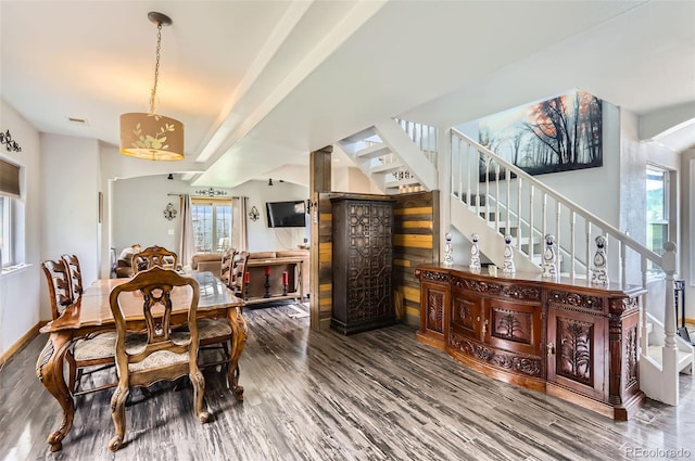 220 Wark Ave, Berthoud, CO 80513 - dining room featuring plenty of natural light, wood finished floors, stairs, and baseboards