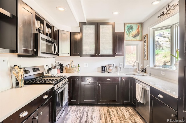 220 Wark Ave, Berthoud, CO 80513 - kitchen with appliances with stainless steel finishes, healthy amount of natural light, light countertops, a sink, and recessed lighting