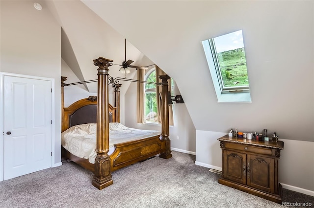 220 Wark Ave, Berthoud, CO 80513 - bedroom with lofted ceiling, light colored carpet, baseboards, and a skylight