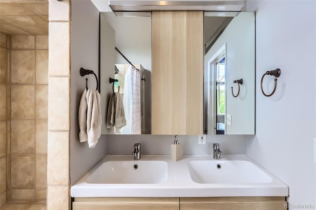 220 Wark Ave, Berthoud, CO 80513 - bathroom featuring tiled shower and double vanity