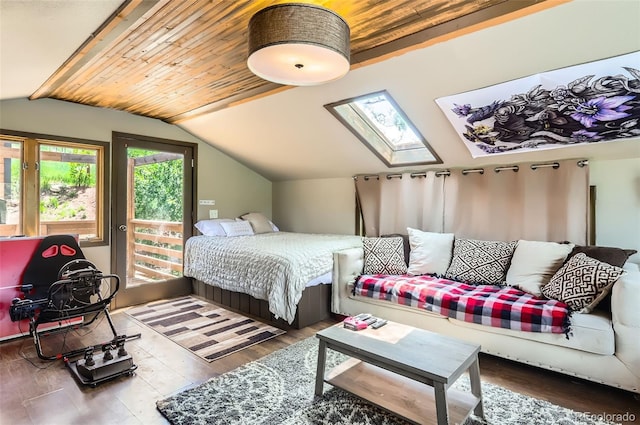 220 Wark Ave, Berthoud, CO 80513 - bedroom with wood finished floors, lofted ceiling, and a skylight