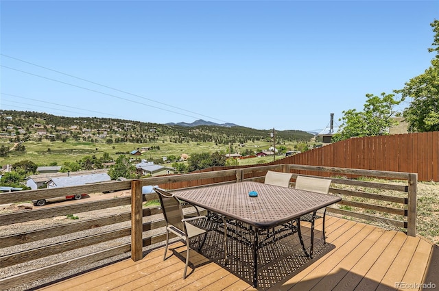 220 Wark Ave, Berthoud, CO 80513 - wooden terrace featuring outdoor dining area and a mountain view